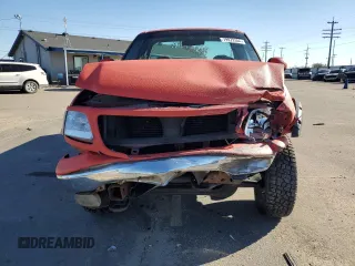 1999 Ford F-150 с VIN 1FTRF18WXXKB91056, выставлен на аукционе Copart как лот 79972304 с пробегом 108 490 миль миль и Списание • Salvage title. История ставок и продаж доступна на DreamBid. Изображение 5.