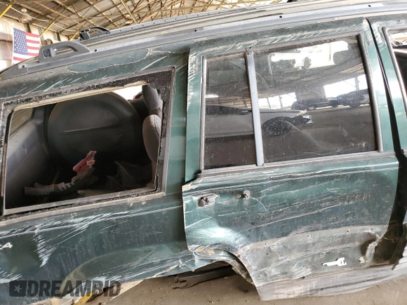 1996 Jeep Grand Cherokee Laredo with VIN 1J4GZ58S6TC304597, listed as a Copart auction lot 52962545 with Not provided miles and Salvage title. Bid and sale history available at DreamBid. Image 10.