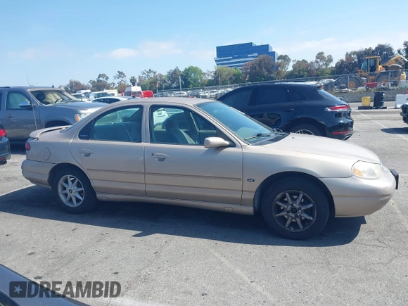1999 Ford Contour z VIN 3FAFP66L6XM102099, wystawiony jako IAAI lot #42161889 z przebiegiem 100 340 mil mil oraz . Historia ofert i sprzedaży dostępna na DreamBid. Obrazek 13.