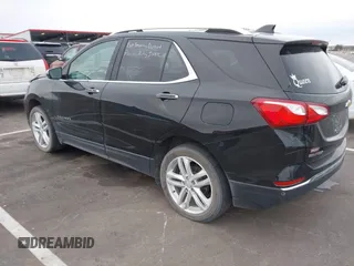 2021 Chevrolet Equinox Premier z VIN 2GNAXXEV4M6118442, wystawiony jako IAAI lot #41392148 z przebiegiem 92 170 mil mil oraz . Historia ofert i sprzedaży dostępna na DreamBid. Obrazek 3.
