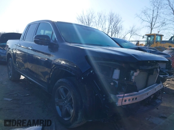 2022 Honda Ridgeline RTL-E with VIN 5FPYK3F77NB034066, listed as a IAAI auction lot 41785064 with 22,098 mi miles and . Bid and sale history available at DreamBid. Image 1.