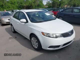 2011 Kia Forte EX with VIN KNAFU4A23B5361487, listed as a IAAI auction lot 42161931 with 179,790 mi miles. Bid and sale history available at carsss.com. Image 1.