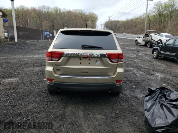 2012 Jeep Grand Cherokee Overland with VIN 1C4RJECT2CC146300, listed as a Copart auction lot 51774655 with 91,947 mi miles and Salvage Title. Bid and sale history available at carsss.com. Image 6.