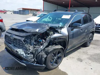 2021 Toyota RAV4 Hybrid XSE with VIN 2T3E6RFV8MW026973, listed as a IAAI auction lot 42052289 with 94,857 mi miles and . Bid and sale history available at DreamBid. Image 2.