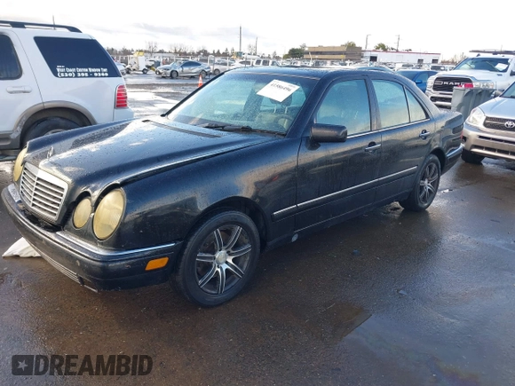 1997 Mercedes-Benz E-Class with VIN WDBJF72F1VA281514, listed as a IAAI auction lot 41586496 with 283,212 mi miles. Bid and sale history available at carsss.com. Image 2.