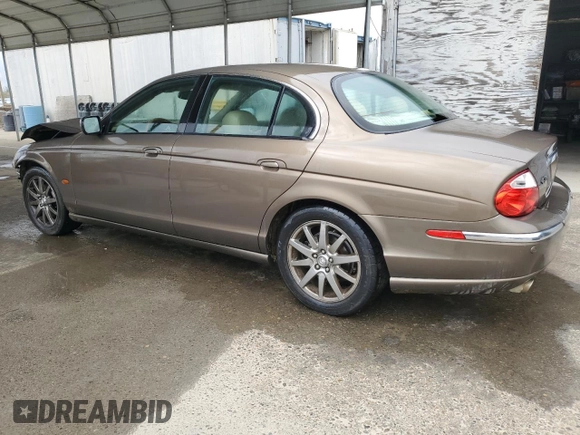 2001 Jaguar S-Type with VIN SAJDA01P21GM04051, listed as a Copart auction lot 46668745 with 81,765 mi miles and Salvage Title. Bid and sale history available at DreamBid. Image 2.