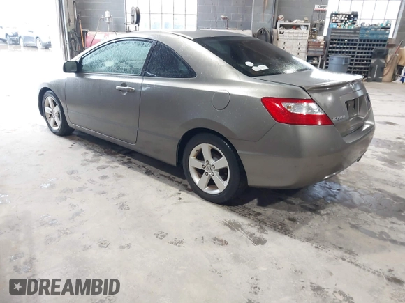 2008 Honda Civic Cpe EX with VIN 2HGFG12878H559388, listed as a IAAI auction lot 42184557 with 164,412 mi miles. Bid and sale history available at carsss.com. Image 2.
