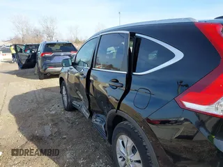 2014 Honda CR-V EX-L with VIN 2HKRM4H79EH688854, listed as a IAAI auction lot 41797298 with 168,658 mi miles. Bid and sale history available at carsss.com. Image 18.