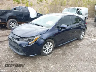 2023 Toyota Corolla LE with VIN 5YFB4MDEXPP032982, listed as a IAAI auction lot 41728893 with 21,887 mi miles and . Bid and sale history available at DreamBid. Image 16.