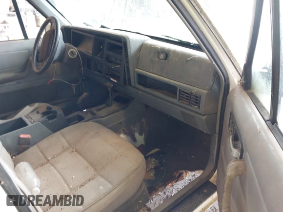 1996 Jeep Cherokee Sport with VIN 1J4FJ68S7TL263437, listed as a IAAI auction lot 42513022 with 158,561 mi miles and . Bid and sale history available at DreamBid. Image 5.