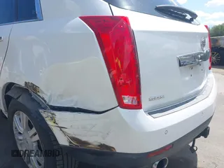 2015 Cadillac SRX Luxury Collection with VIN 3GYFNBE38FS584296, listed as a IAAI auction lot 41950092 with 56,691 mi miles and . Bid and sale history available at carsss.com. Image 6.