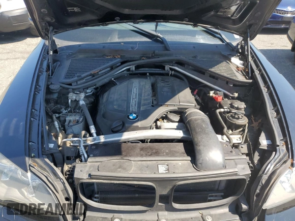 2012 BMW X5 35i with VIN 5UXZV4C54CL752079, listed as a Copart auction lot 62147515 with 147,244 mi miles and Clean title. Bid and sale history available at DreamBid. Image 12.