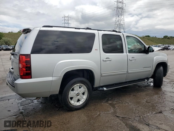 2011 Chevrolet Suburban LT with VIN 1GNSKJE31BR224959, listed as a Copart auction lot 58974345 with Not provided miles and Salvage title. Bid and sale history available at DreamBid. Image 3.