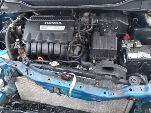 2012 Honda Insight with VIN JHMZE2H31CS005377, listed as a IAAI auction lot 41879122 with 136,646 mi miles and . Bid and sale history available at DreamBid. Image 10.