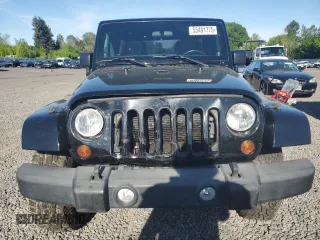 2013 Jeep Wrangler Unlimited Rubicon z VIN 1C4HJWFG6DL557085, wystawiony jako Copart lot #55491775 z przebiegiem 139 240 mil mil oraz Szkoda całkowita • Salvage title. Historia ofert i sprzedaży dostępna na DreamBid. Obrazek 5.