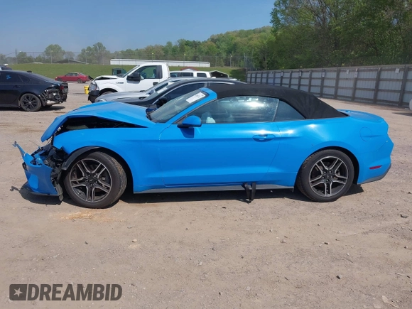 2022 Ford Mustang EcoBoost z VIN 1FATP8UH8N5115470, wystawiony jako IAAI lot #42065747 z przebiegiem 62 335 mil mil oraz . Historia ofert i sprzedaży dostępna na DreamBid. Obrazek 14.