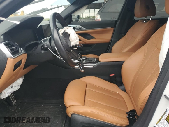 2023 BMW 4 Series 430i xDrive z VIN WBA73AV08PFM91846, wystawiony jako Copart lot #55291695 z przebiegiem Nie podano mil oraz Szkoda całkowita • Salvage title. Historia ofert i sprzedaży dostępna na DreamBid. Obrazek 7.