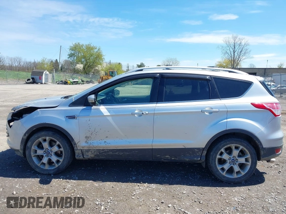 2016 Ford Escape Titanium with VIN 1FMCU9JX6GUB80715, listed as a IAAI auction lot 42060305 with 132,951 mi miles and . Bid and sale history available at DreamBid. Image 14.