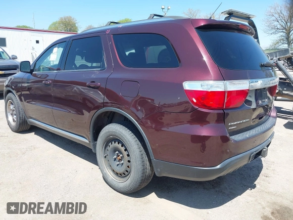 2012 Dodge Durango Crew with VIN 1C4RDJDG0CC337408, listed as a IAAI auction lot 42193647 with 186,352 mi miles and . Bid and sale history available at carsss.com. Image 3.