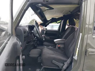 2016 Jeep Wrangler Unlimited Sport with VIN 1C4BJWDG3GL140326, listed as a IAAI auction lot 42385929 with 92,428 mi miles and . Bid and sale history available at DreamBid. Image 5.