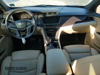 2017 Cadillac XT5 Luxury AWD with VIN 1GYKNDRS8HZ221062, listed as a Copart auction lot 54223415 with 103,791 mi miles and Salvage Title. Bid and sale history available at DreamBid. Image 8.