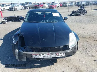 2004 Nissan 350Z Touring with VIN JN1AZ34D94M102990, listed as a IAAI auction lot 41830661 with 107,520 mi miles. Bid and sale history available at carsss.com. Image 13.