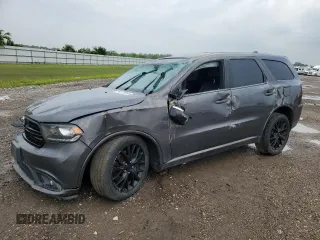 2015 Dodge Durango R/T with VIN 1C4SDHCT2FC194183, listed as a Copart auction lot 54378565 with 116,276 mi miles and Salvage title. Bid and sale history available at DreamBid. Image 1.