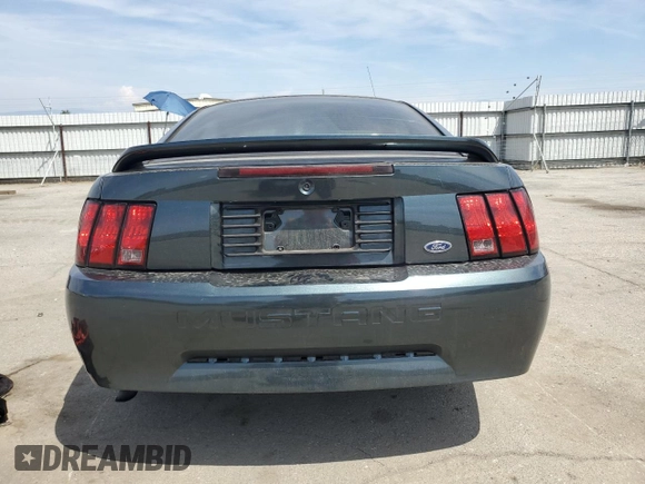 1999 Ford Mustang z VIN 1FAFP4041XF140264, wystawiony jako Copart lot #54801555 z przebiegiem 156 514 mil mil oraz Szkoda całkowita • Salvage title. Historia ofert i sprzedaży dostępna na DreamBid. Obrazek 6.