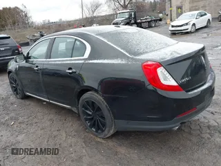 2014 Lincoln MKS with VIN 1LNHL9EK3EG601471, listed as a IAAI auction lot 41142126 with 110,432 mi miles. Bid and sale history available at carsss.com. Image 3.