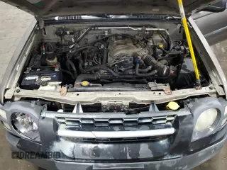 2004 Nissan Xterra XE with VIN 5N1ED28YX4C650888, listed as a Copart auction lot 57151695 with 142,210 mi miles and Salvage title. Bid and sale history available at DreamBid. Image 12.