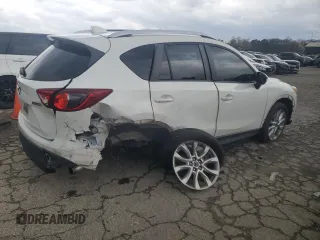 2015 Mazda CX-5 Grand Touring with VIN JM3KE2DY6F0504784, listed as a Copart auction lot 47671705 with 174,682 mi miles and Salvage Title. Bid and sale history available at carsss.com. Image 3.