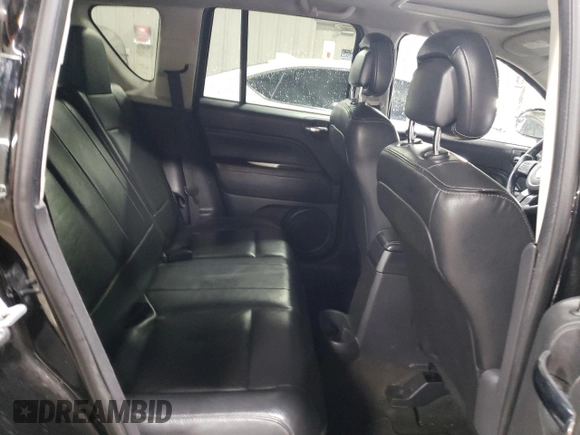 2014 Jeep Compass Latitude with VIN 1C4NJCEA2ED887736, listed as a Copart auction lot 51675375 with 103,403 mi miles and Salvage Title. Bid and sale history available at carsss.com. Image 10.