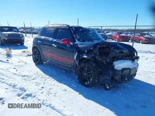 2011 MINI Countryman S with VIN WMWZC5C50BWL55234, listed as a IAAI auction lot 41323339 with 134,709 mi miles and . Bid and sale history available at DreamBid. Image 1.