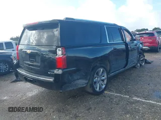 2018 Chevrolet Suburban Premier with VIN 1GNSCJKC2JR199702, listed as a IAAI auction lot 41136128 with 80,103 mi miles and . Bid and sale history available at DreamBid. Image 4.