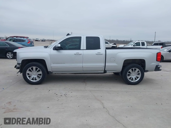 2018 Chevrolet Silverado 1500 LT with VIN 1GCRCREH8JZ172209, listed as a IAAI auction lot 41569533 with 144,475 mi miles and . Bid and sale history available at DreamBid. Image 14.