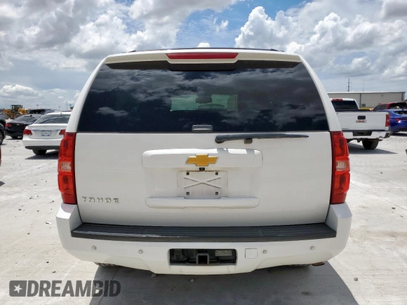 2014 Chevrolet Tahoe LT with VIN 1GNSCBE07ER239575, listed as a Copart auction lot 63094525 with 142,467 mi miles and Salvage title. Bid and sale history available at DreamBid. Image 6.