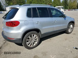 2012 Volkswagen Tiguan SE z VIN WVGAV7AXXCW513800, wystawiony jako Copart lot #53005945 z przebiegiem 155 920 mil mil oraz Tytuł czysty. Historia ofert i sprzedaży dostępna na DreamBid. Obrazek 3.