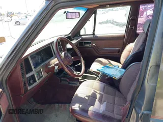 1987 Jeep Cherokee with VIN 1JCML7849HT112362, listed as a IAAI auction lot 42646285 with 162,661 mi miles and . Bid and sale history available at DreamBid. Image 5.