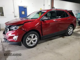 2021 Chevrolet Equinox Premier z VIN 2GNAXXEVXM6151610, wystawiony jako Copart lot #60805265 z przebiegiem 14 520 mil mil oraz Szkoda całkowita • Salvage title. Historia ofert i sprzedaży dostępna na DreamBid. Obrazek 1.