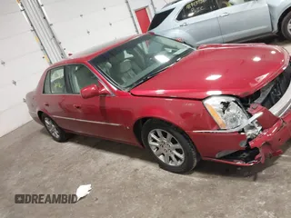 2009 Cadillac DTS w/1SA with VIN 1G6KD57Y59U149387, listed as a IAAI auction lot 41957750 with 94,939 mi miles. Bid and sale history available at carsss.com. Image 13.