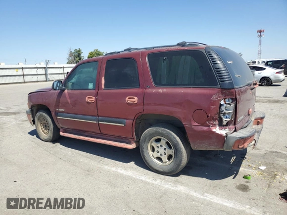 2001 Chevrolet Tahoe LT with VIN 1GNEC13T71R164164, listed as a Copart auction lot 60066165 with 234,506 mi miles and Salvage title. Bid and sale history available at DreamBid. Image 2.