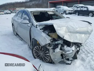 2014 Lincoln MKZ z VIN 3LN6L2J92ER832064, wystawiony jako IAAI lot #41374046 z przebiegiem 84 000 mil mil oraz . Historia ofert i sprzedaży dostępna na DreamBid. Obrazek 1.