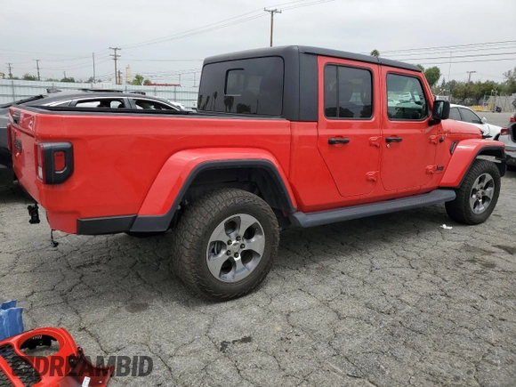 2023 Jeep Gladiator Sport S with VIN 1C6HJTAG4PL547608, listed as a Copart auction lot 52566245 with 8,464 mi miles and Salvage title. Bid and sale history available at DreamBid. Image 3.