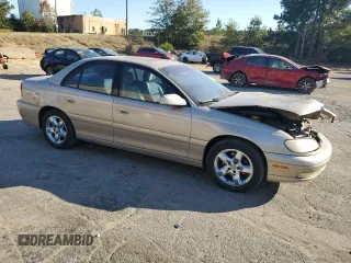 2001 Cadillac Catera z VIN W06VR54R21R039740, wystawiony jako Copart lot #77206494 z przebiegiem 41 180 mil mil oraz Szkody całkowita. Historia ofert i sprzedaży dostępna na DreamBid. Obrazek 4.