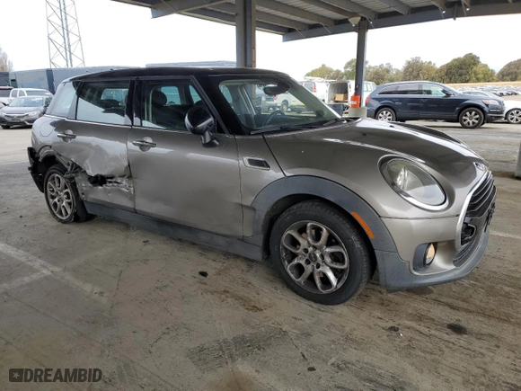 2017 MINI Clubman Cooper with VIN WMWLN5C50H2E32560, listed as a Copart auction lot 47664365 with 75,182 mi miles and Salvage Title. Bid and sale history available at carsss.com. Image 4.