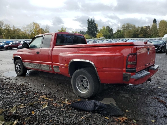 1998 Dodge 3500 with VIN 1B7MC33D2WJ134262, listed as a Copart auction lot 77394114 with 178,056 mi miles and Salvage Title. Bid and sale history available at carsss.com. Image 2.