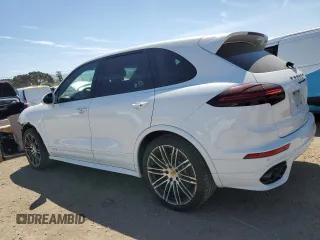2016 Porsche Cayenne GTS with VIN WP1AD2A20GLA76054, listed as a Copart auction lot 55176615 with 54,274 mi miles and Salvage title. Bid and sale history available at DreamBid. Image 2.