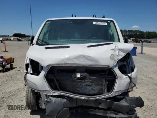 2023 Ford Transit Cargo z VIN 1FTBR1Y85PKB27419, wystawiony jako Copart lot #58053535 z przebiegiem Nie podano mil oraz Szkoda całkowita • Salvage title. Historia ofert i sprzedaży dostępna na DreamBid. Obrazek 5.
