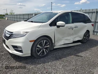 2019 Honda Odyssey Touring with VIN 5FNRL6H80KB501681, listed as a Copart auction lot 58814945 with 105,287 mi miles and Salvage title. Bid and sale history available at DreamBid. Image 1.