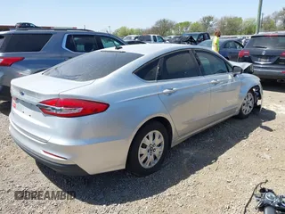 2019 Ford Fusion S with VIN 3FA6P0G71KR275393, listed as a IAAI auction lot 41827288 with 108,160 mi miles and . Bid and sale history available at DreamBid. Image 4.